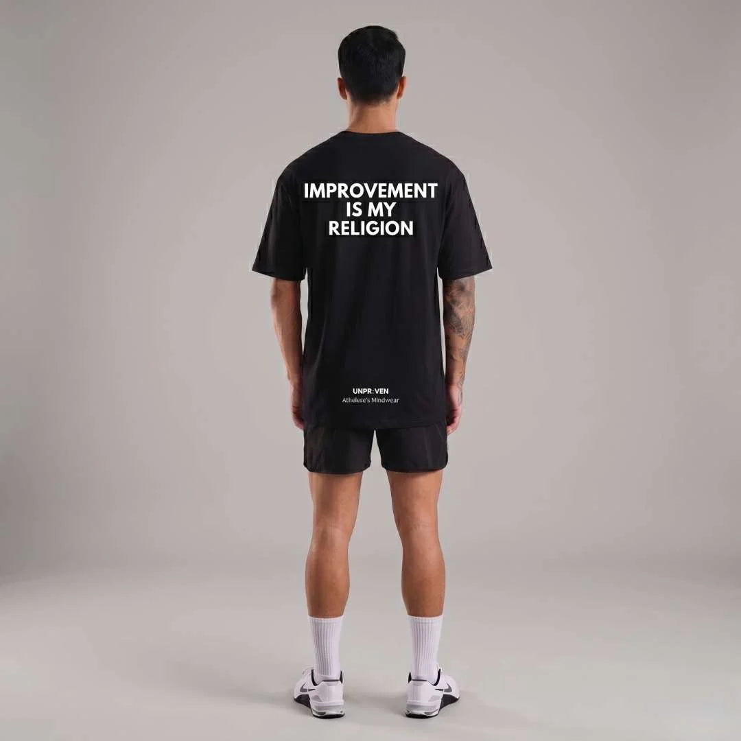 Oversize workout, gyming, running, and doing mma  tshirt for mens  from unproven with design on back improvement is my religion