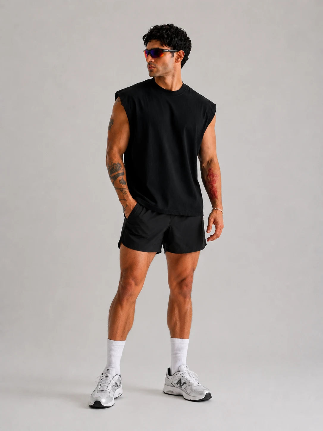 UNPROVEN front view of the improvement is my religion black oversize or boxy fit tank top