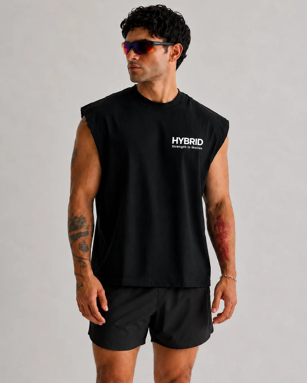 Breathable boxy fit workout tank designed for hybrid training and active movement